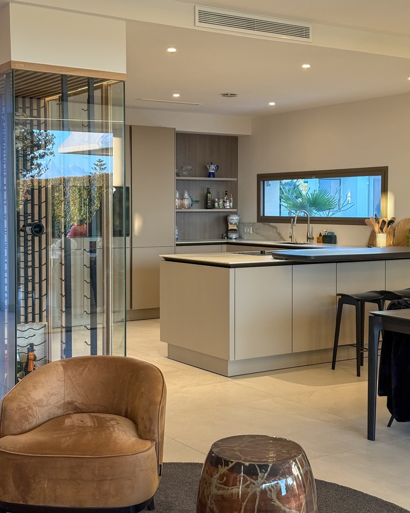 Completed villa renovation featuring a modern kitchen, interior painting, tile flooring, and high-quality finishes in Phuket